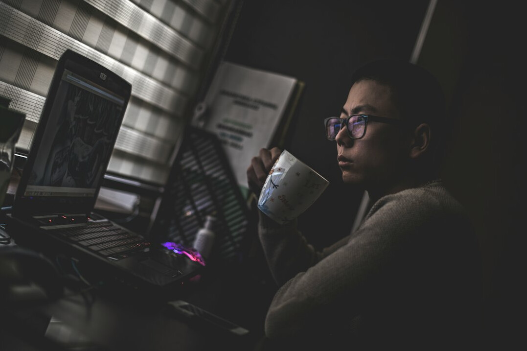 woman coding at home