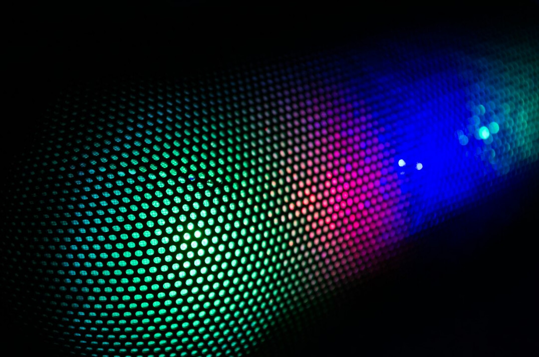 Monitor with colorful programming code on a dark screen