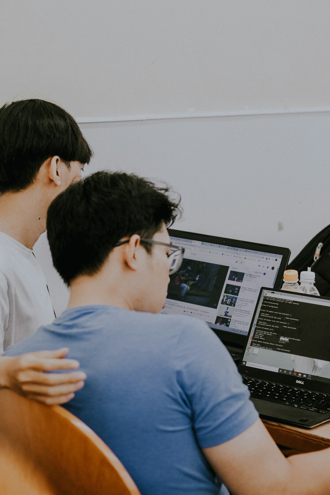 diverse students coding together