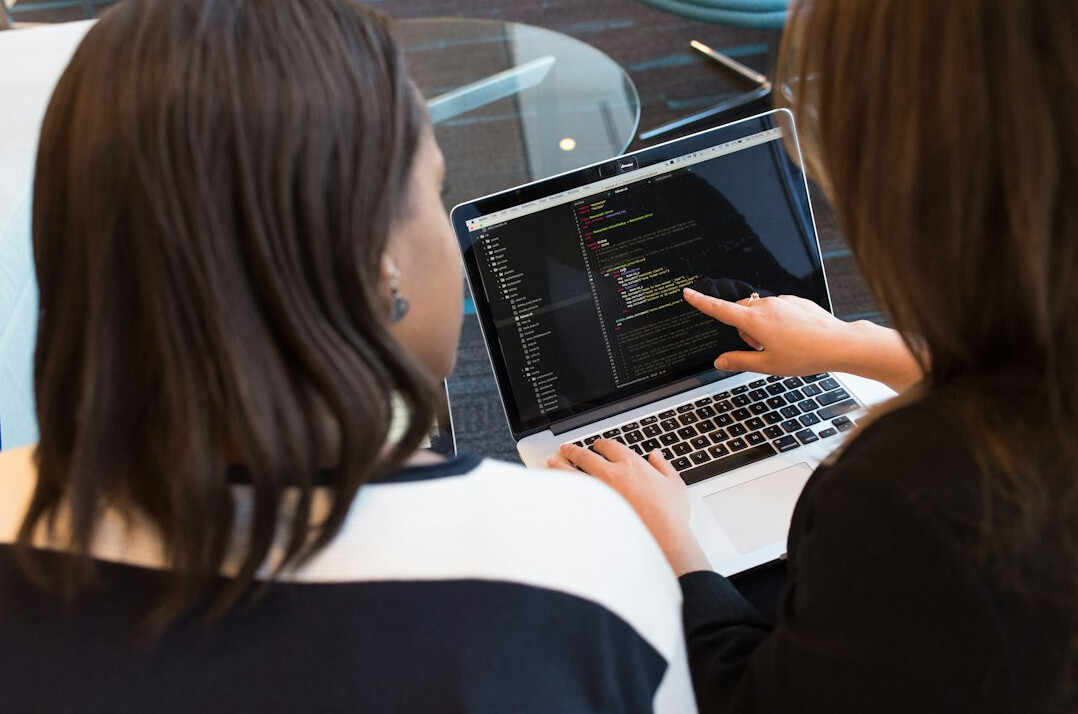 woman teaching coding class