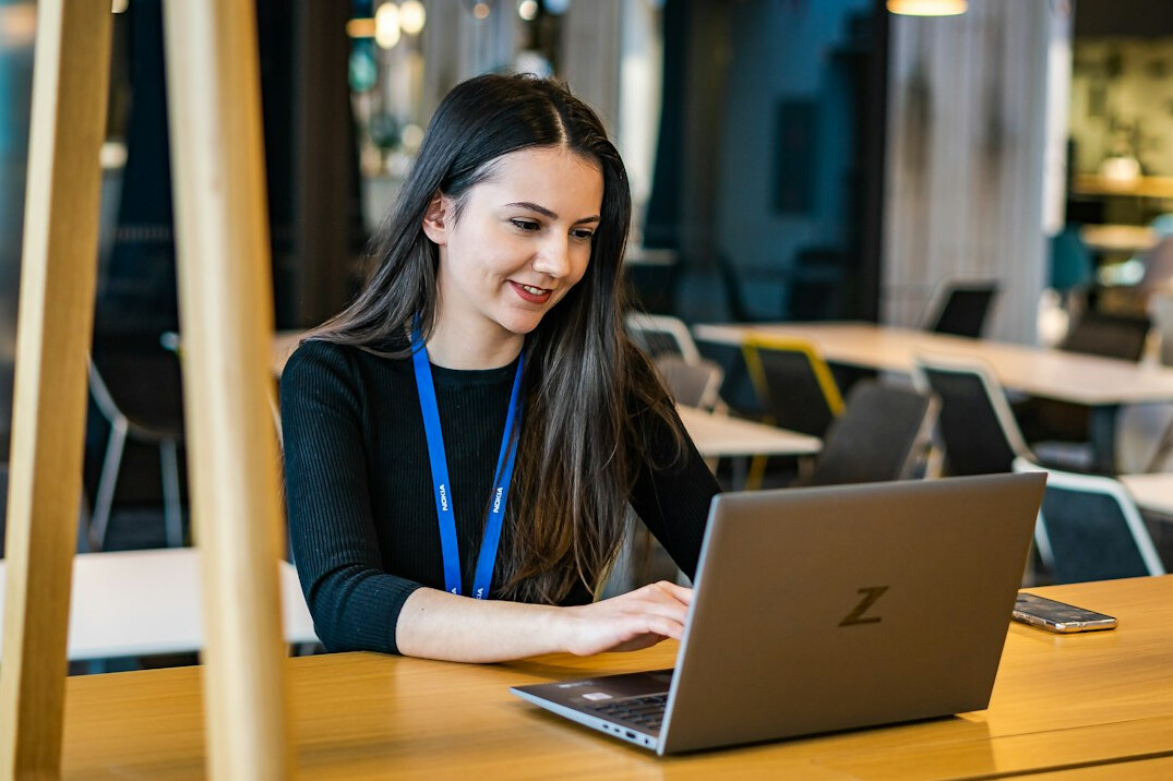 woman working on laptop in office