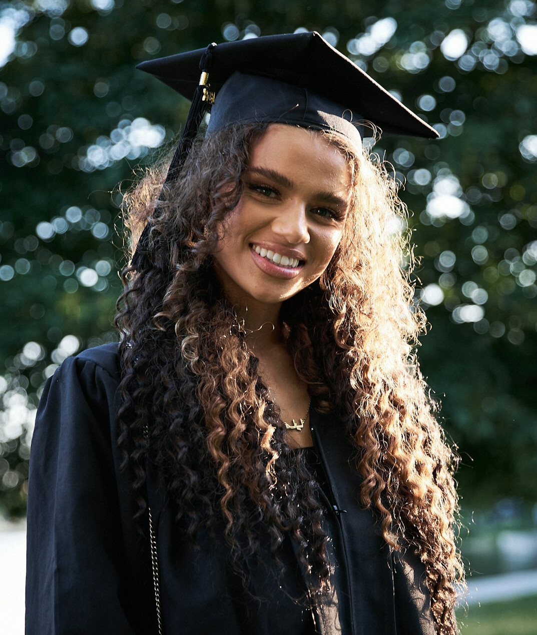 successful it graduate smiling